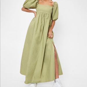 green dress, puff sleeves with thigh high slit